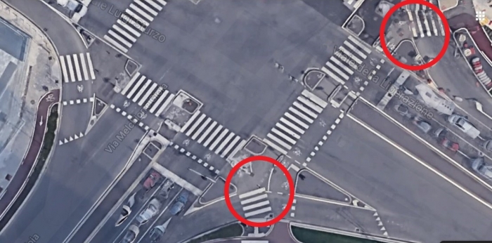 Via M. Gioia angolo viale della Liberazione: i due attraversamenti ciclabili perpendicolari finiscono contro delle strisce pedonali e non si raccordano tra loro.